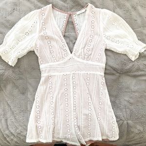 Lush delicate white romper with puff sleeve